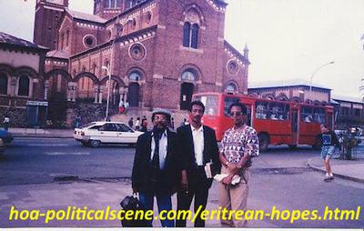 hoa-politicalscene.com/eritrean-hopes.html - Eritrean hopes: Journalist Khalid Mohammed Osman with his brother chancellor Mubarak and friend artist Altahir Salih in front of the Cathedral in Asmara.